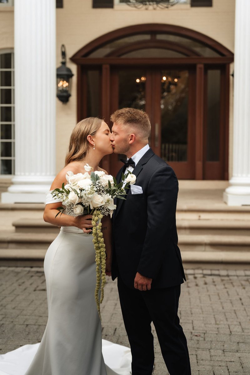 A couple during their first look, photographed from a distance