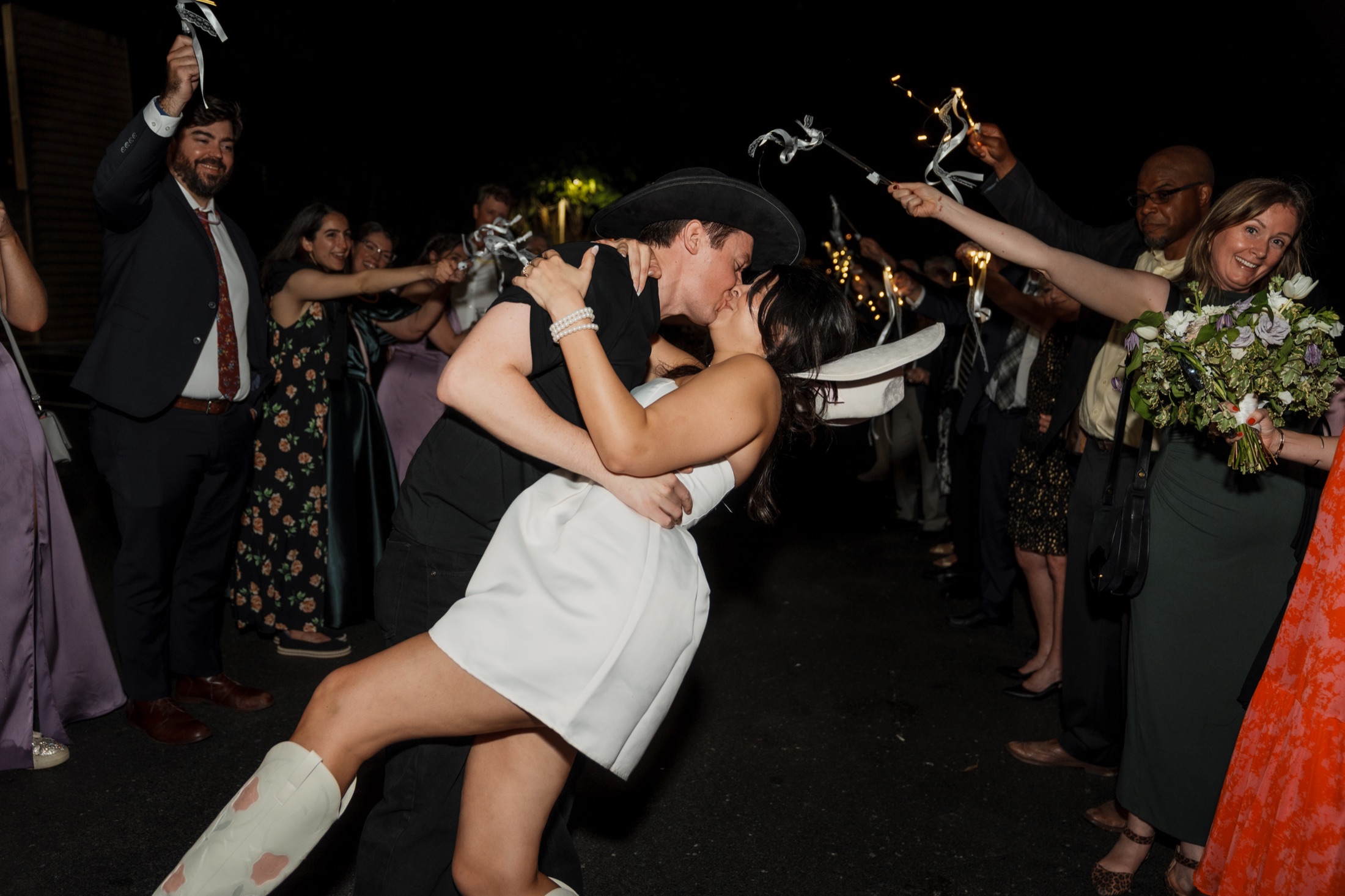 Carleigh and Connor celebrating at their wedding