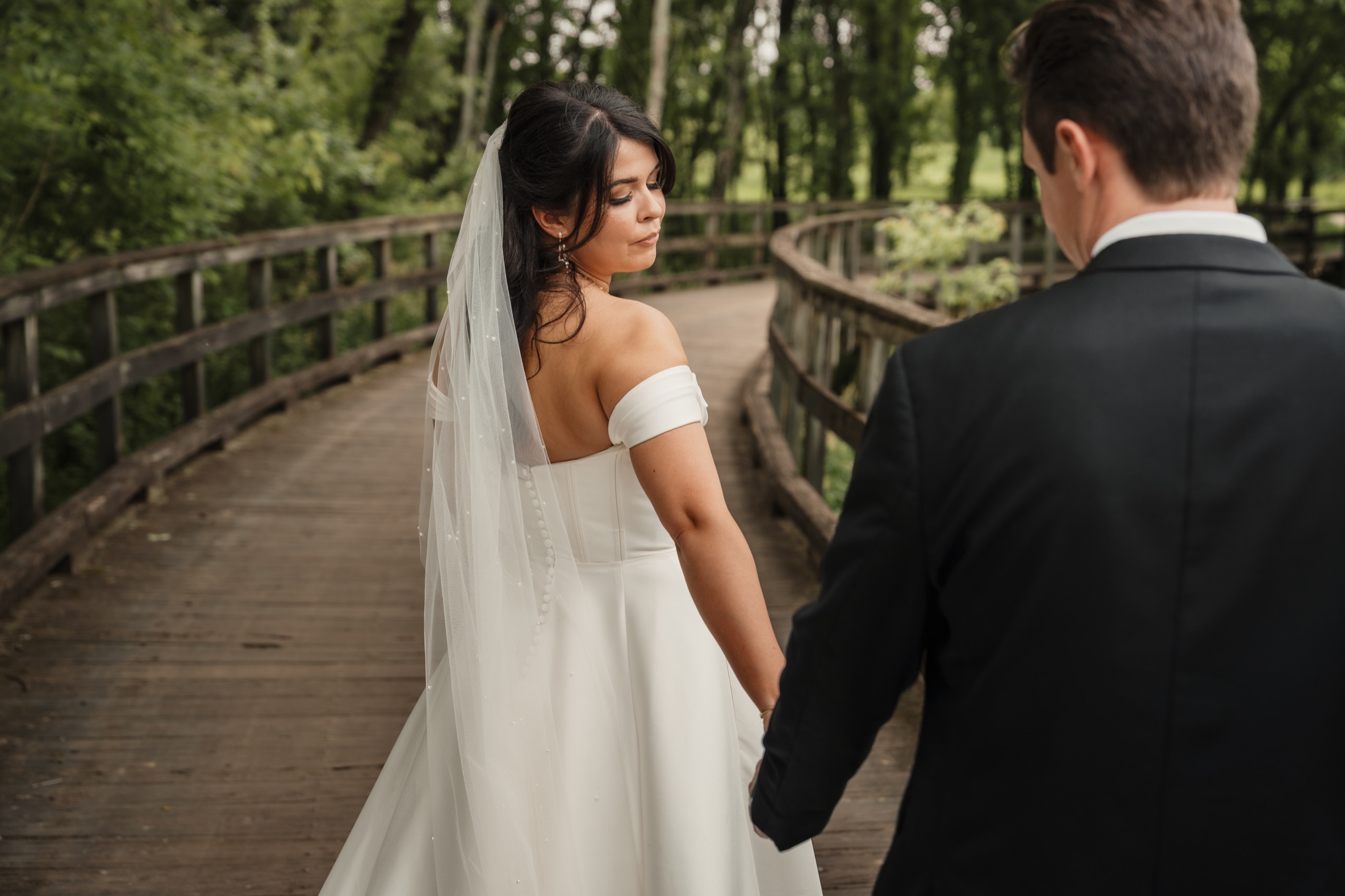 Carleigh looking back while walking with Connor