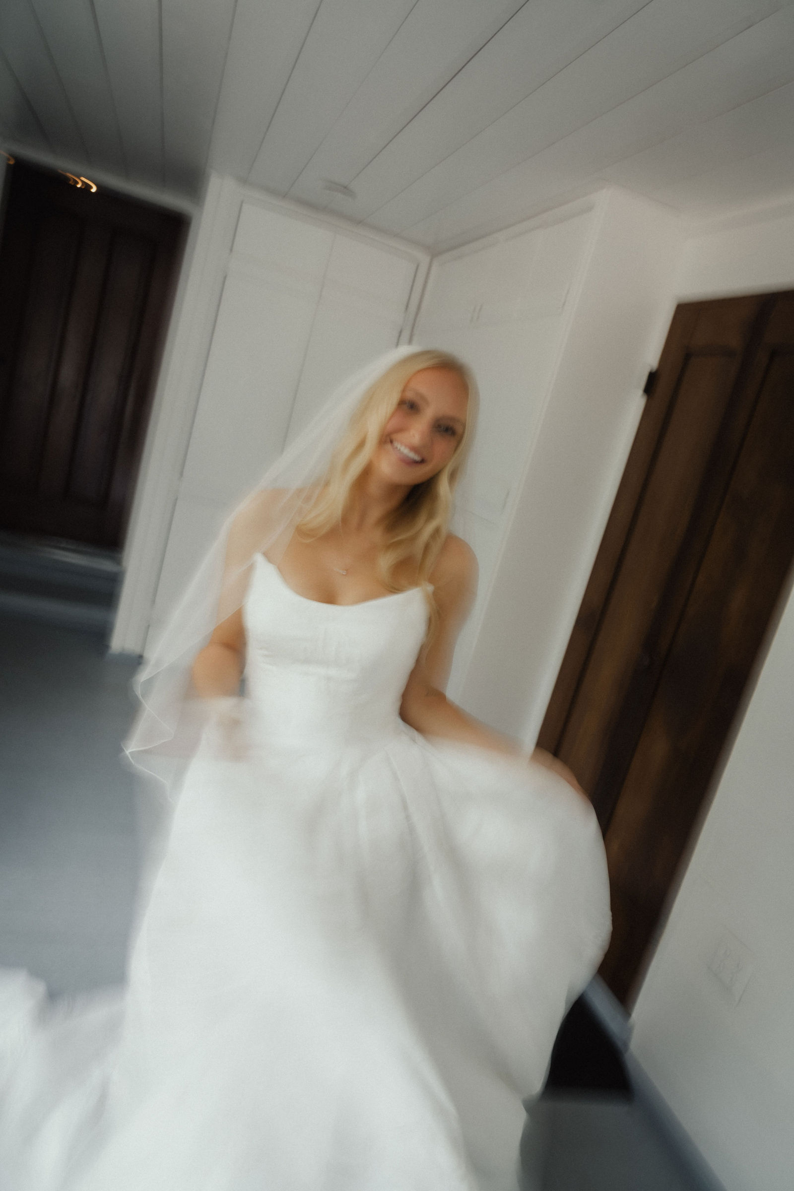 Denalyn spinning in her dress, caught mid-motion