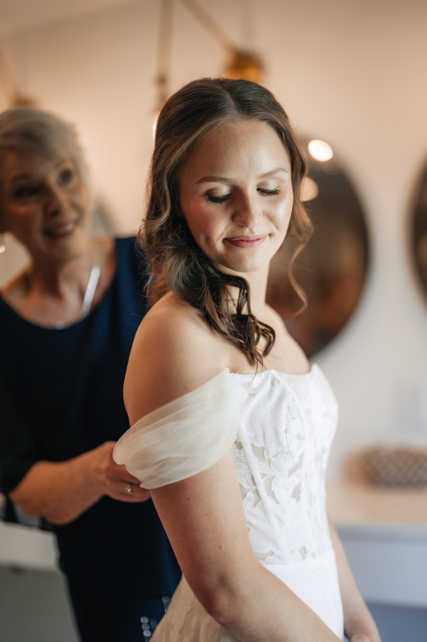 Katie getting ready in her wedding dress