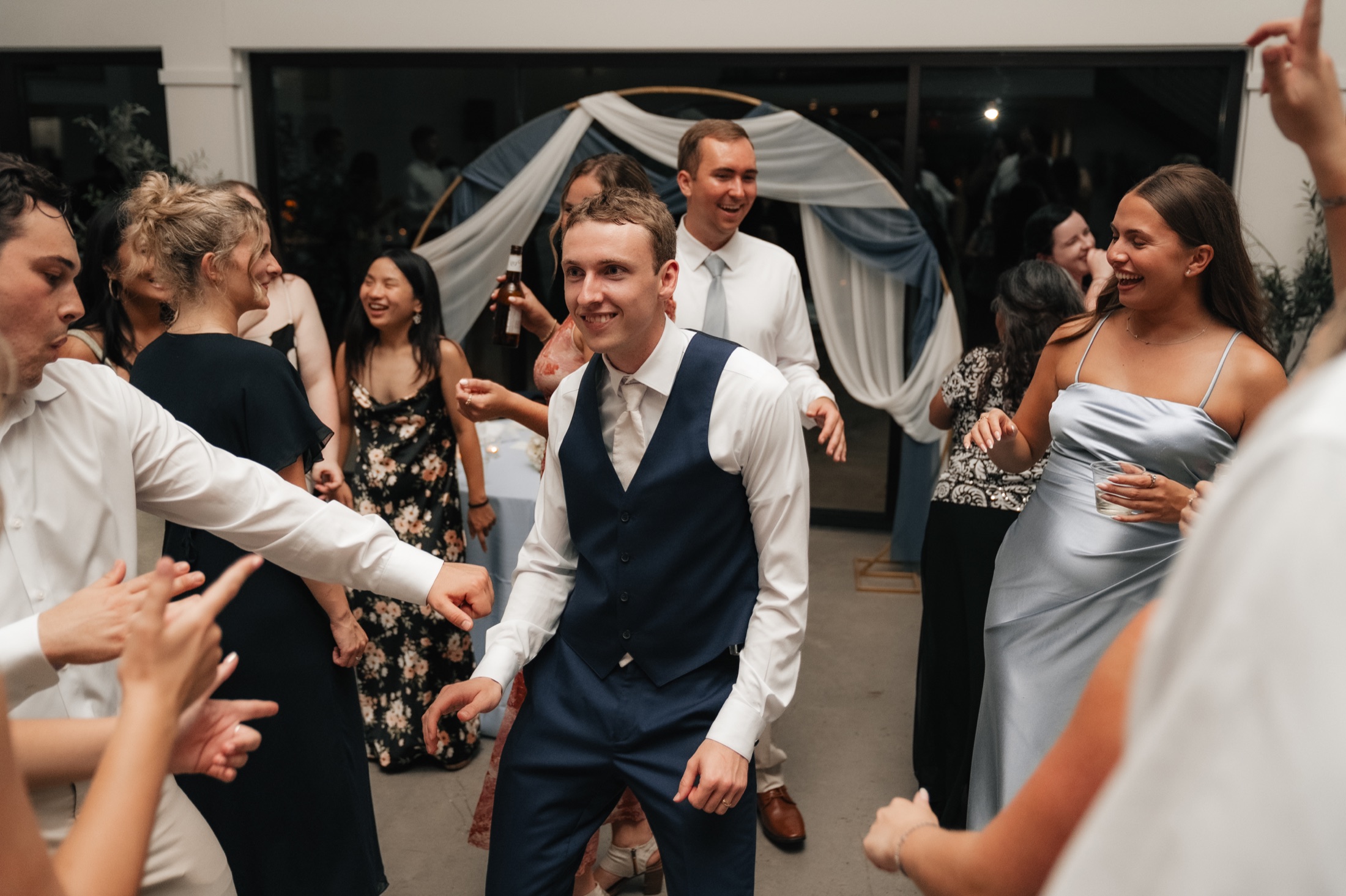 Zach entering the dance floor at the reception
