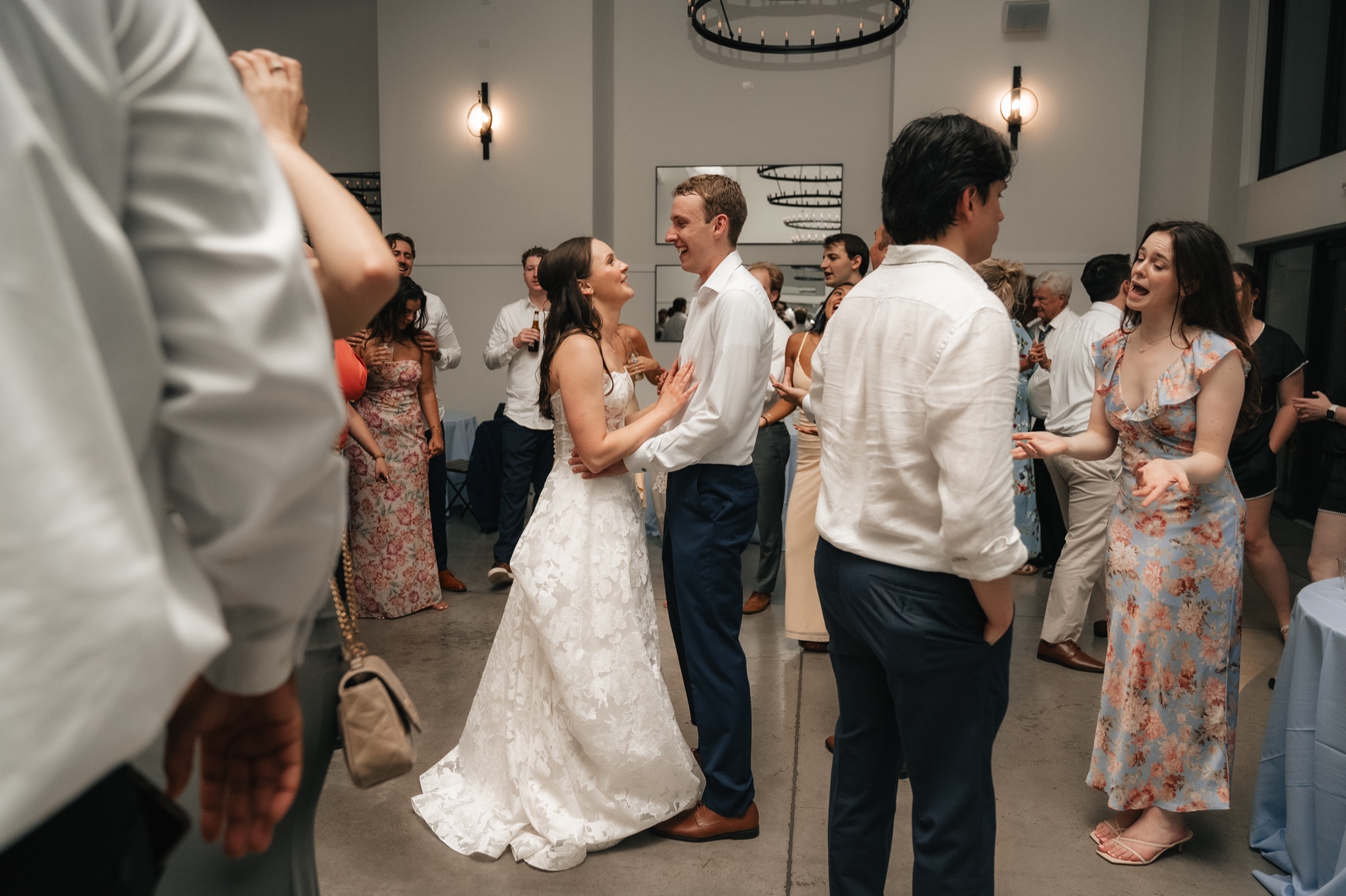 Katie and Zach dancing together at their reception