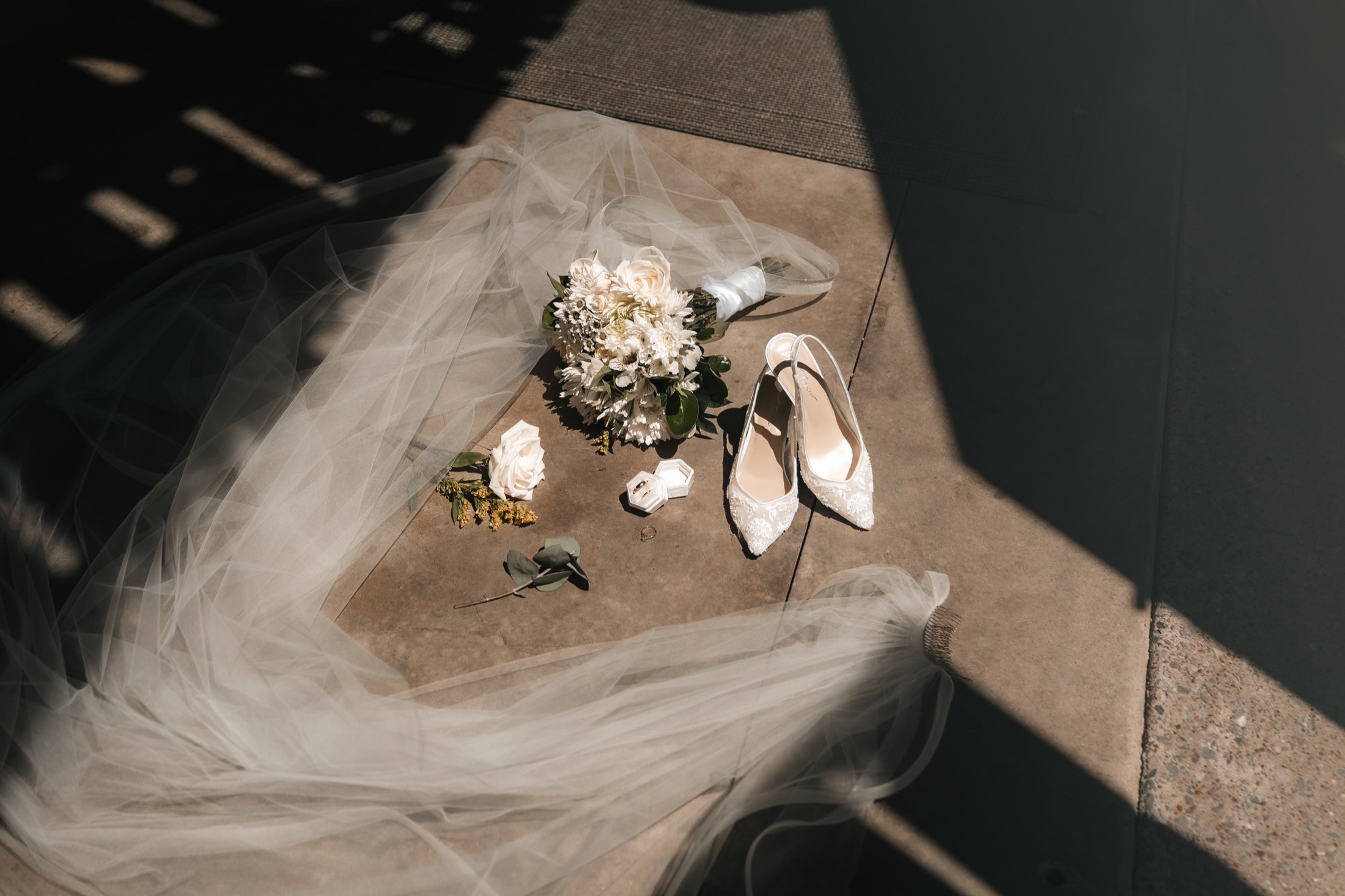 Katie and Zach’s wedding dress, stationery, rings, and details