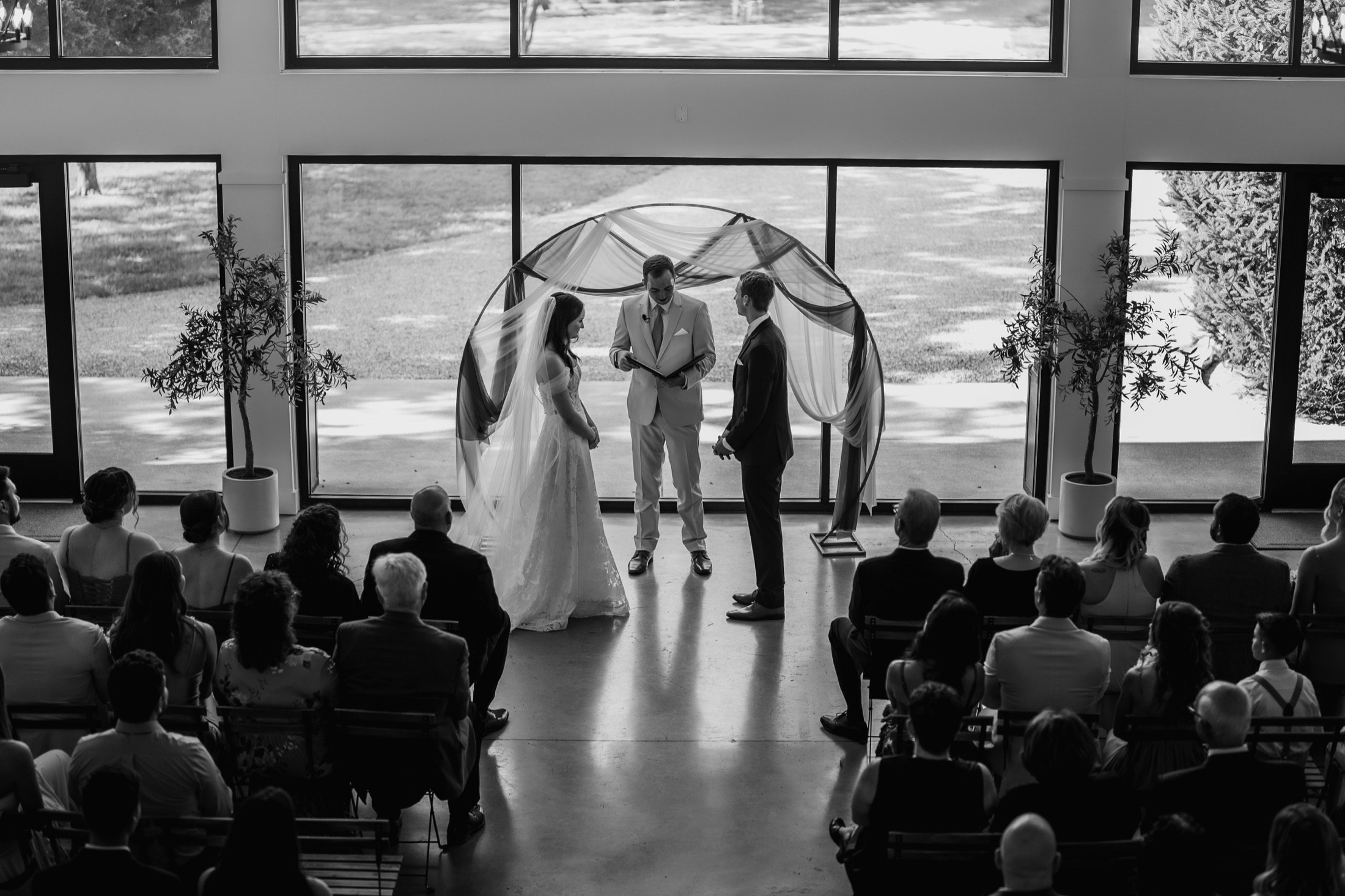 A black-and-white view of Katie and Zach’s ceremony