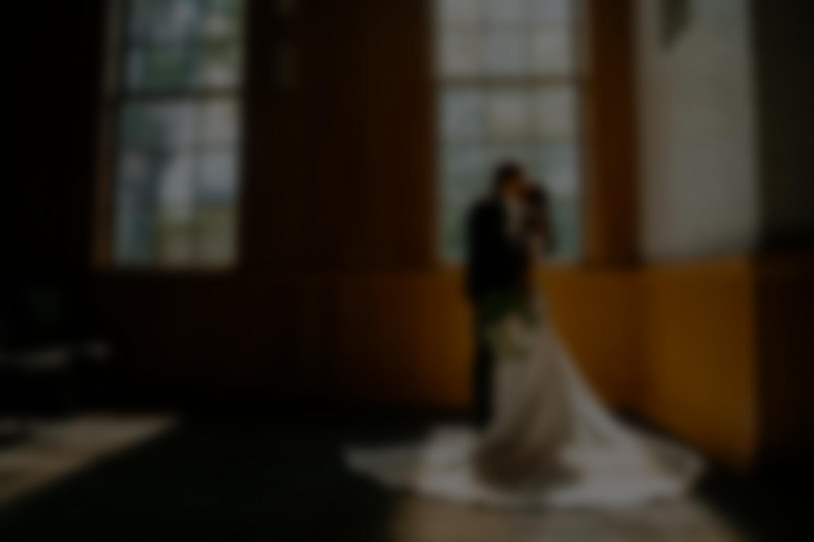 Bride and groom photographed by LY Photography Co